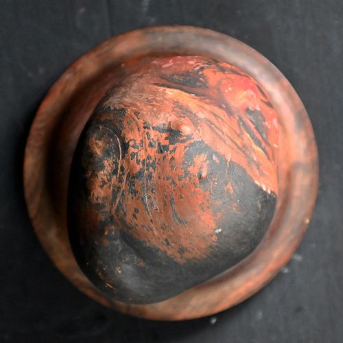 fig 2. A pair of 19th-century folk art carved heads with painted facial features mounted on circular turned wooden bases.