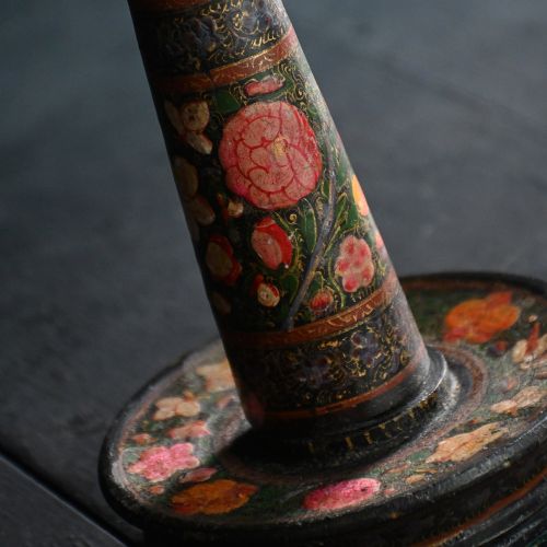 fig 2. An early 20th-century hand-painted Kashmiri table lamp base featuring dark lacquer with red and gold floral motifs and a brass fitting.