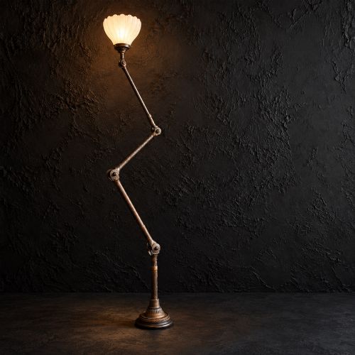fig 3. An early 20th-century four-arm articulated brass floor lamp with a white frilled glass shade on a heavy circular base.