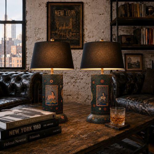 fig 1. A pair of late 19th-century cylindrical dark enamel table lamps decorated with painted horse motifs and beige drum shades.