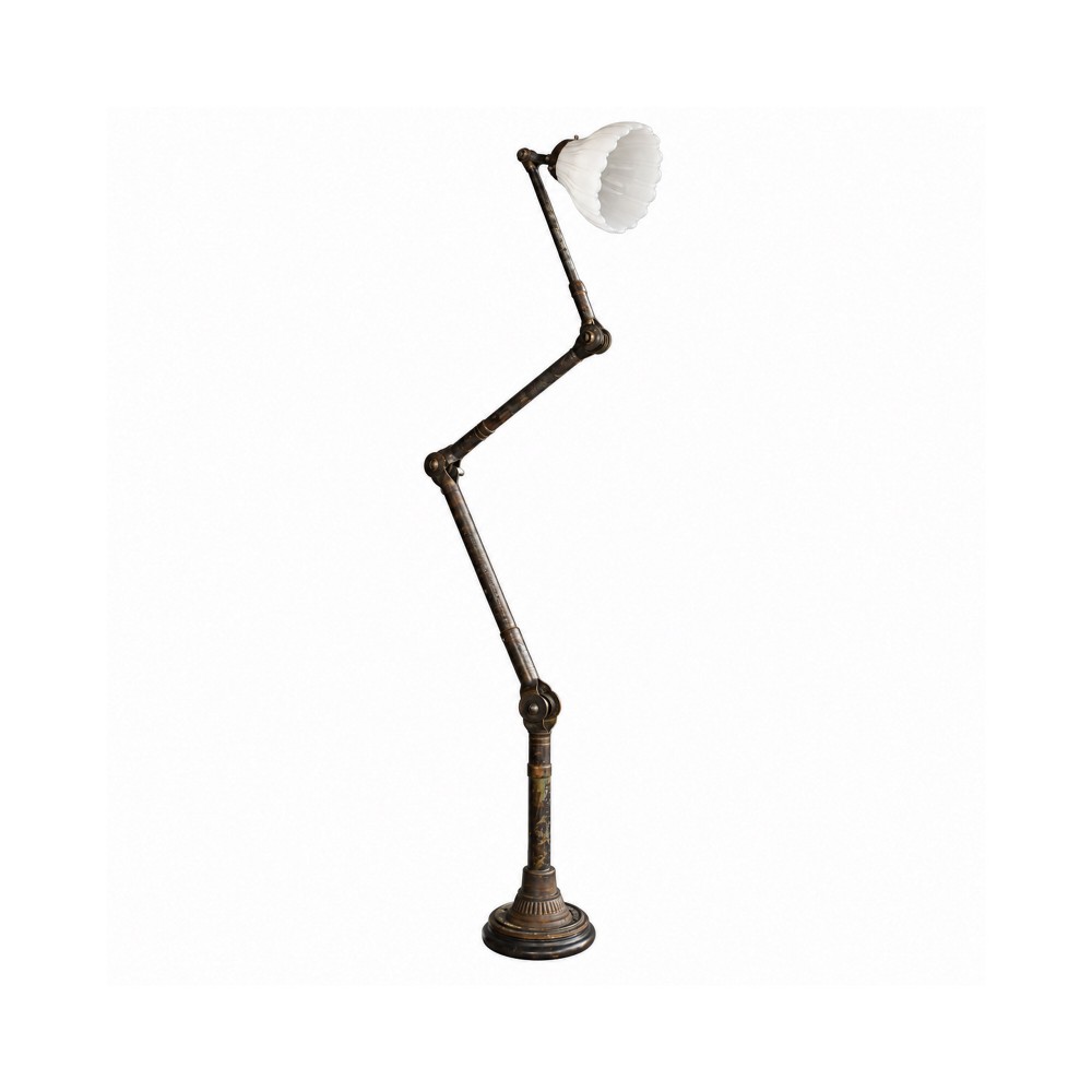 An early 20th-century four-arm articulated brass floor lamp with a white frilled glass shade on a heavy circular base.