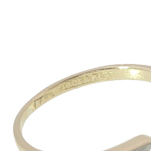 fig 1. An Edwardian 18ct yellow gold and platinum ring featuring a daisy cluster of old-cut diamonds with additional diamond accents on the shoulders.