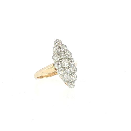 fig 1. An Edwardian navette cluster ring featuring multiple old cut diamonds set in platinum with an 18ct yellow gold band.