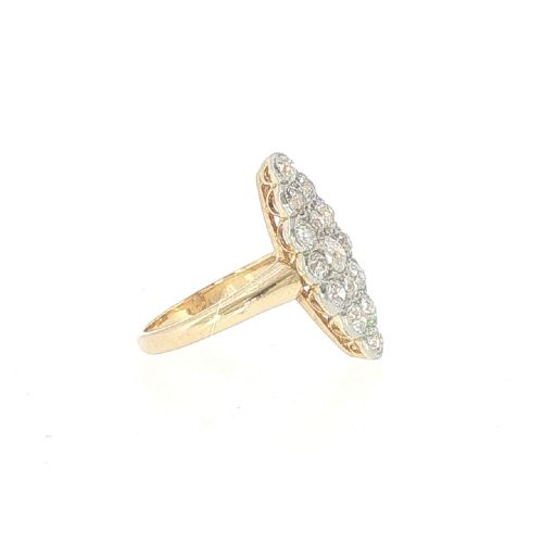 fig 2. An Edwardian navette cluster ring featuring multiple old cut diamonds set in platinum with an 18ct yellow gold band.