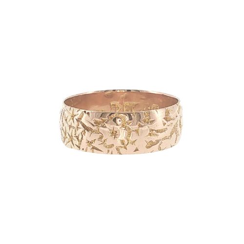 fig 1. An Edwardian 9ct rose gold band ring featuring detailed hand engraving and a smooth inner profile.