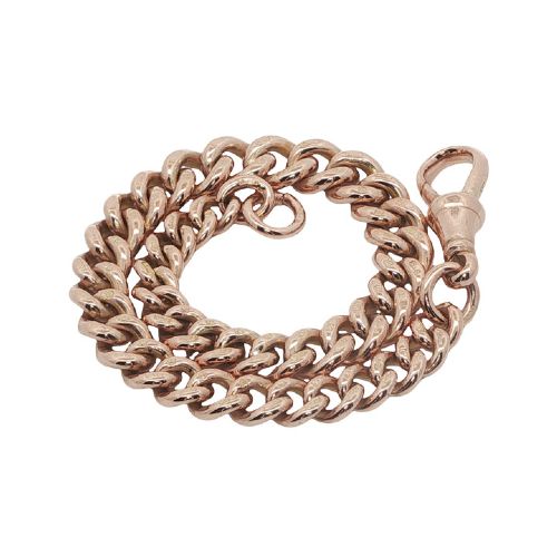 fig 2. An antique 9ct rose gold graduated curb link Albert bracelet with a swivel clip fastener on a plain white background.