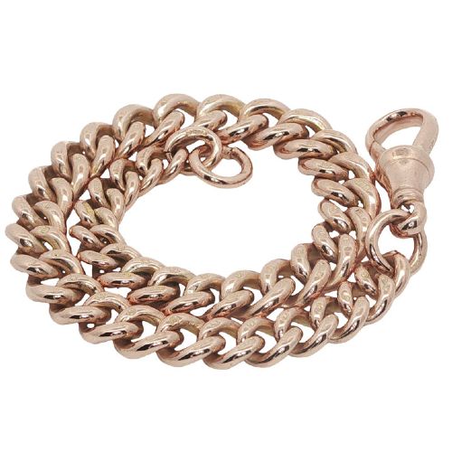 fig 3. An antique 9ct rose gold graduated curb link Albert bracelet with a swivel clip fastener on a plain white background.