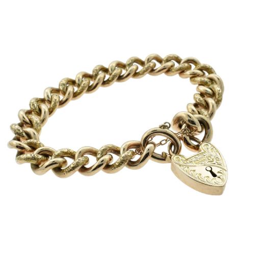 An antique 9ct rose gold curb chain bracelet featuring alternating hand-engraved links, a heart-shaped padlock clasp, and a safety chain. View III