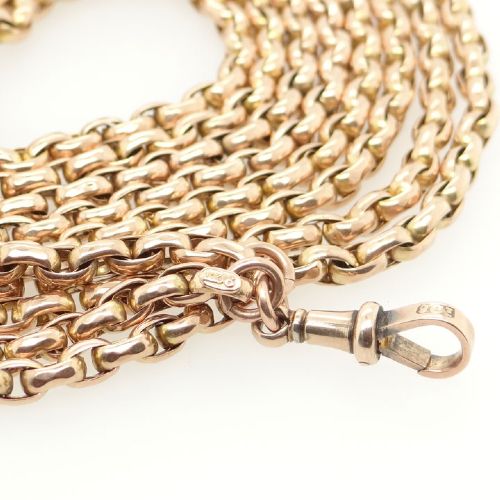 fig 1. An antique 9ct rose gold long guard chain composed of uniform belcher links folded into multiple strands.