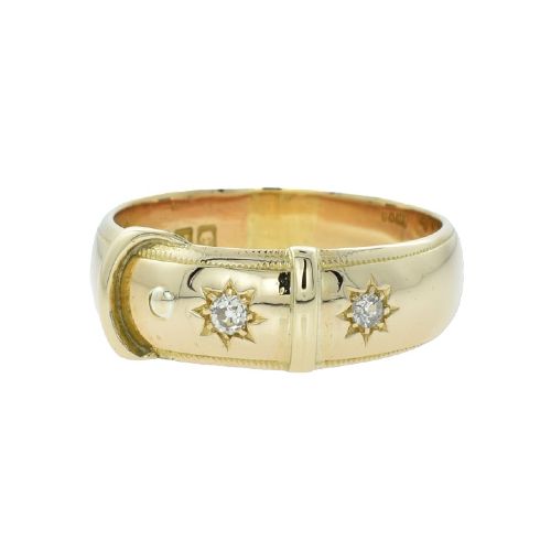 An antique Victorian 18ct yellow gold buckle band featuring star-set diamonds.