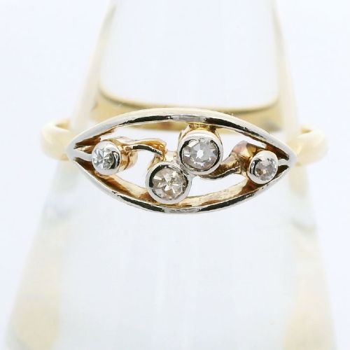 An 18ct yellow gold band with an elongated openwork navette head holding four round bezel-set diamonds. View II