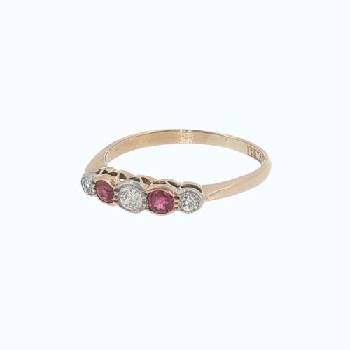 fig 3. An antique 18ct yellow gold ring featuring a five-stone setting with alternating rubies and diamonds.
