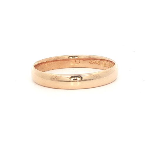 fig 1. A plain 3mm 22ct yellow gold wedding band ring displaying visible internal hallmarks.