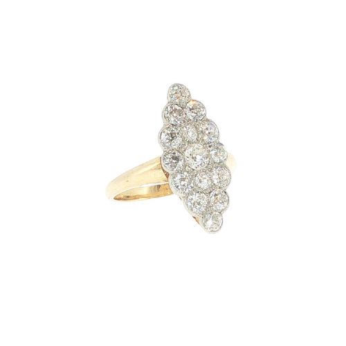 fig 3. An Edwardian navette cluster ring featuring multiple old cut diamonds set in platinum with an 18ct yellow gold band.