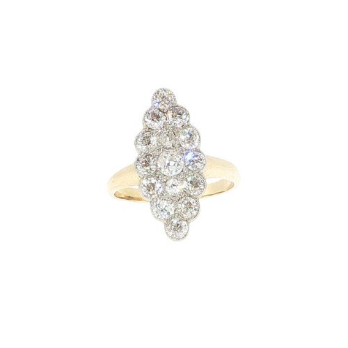 fig 4. An Edwardian navette cluster ring featuring multiple old cut diamonds set in platinum with an 18ct yellow gold band.