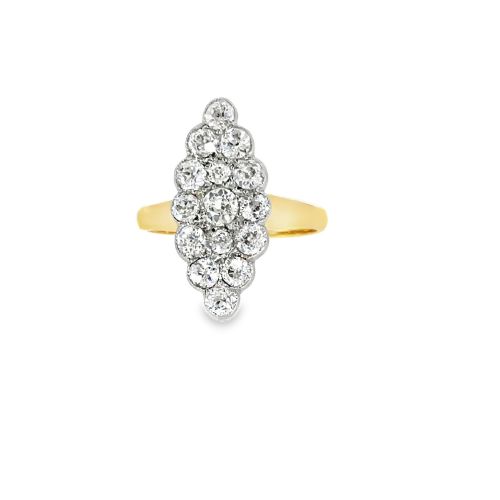fig 3. An Edwardian navette cluster ring featuring multiple old cut diamonds set in platinum with an 18ct yellow gold band.