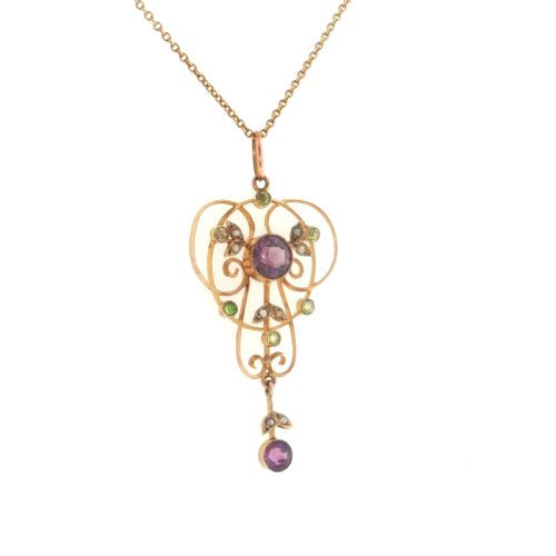 fig 2. An openwork 9ct gold Edwardian pendant set with round amethysts, peridots, and seed pearls suspended on a fine chain.