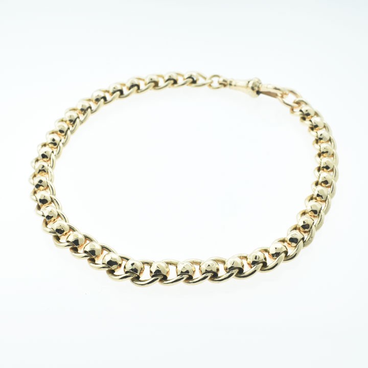 An antique 9ct rose gold chain bracelet featuring circular links inset with rollerballs and fitted with a swivel clasp. View II