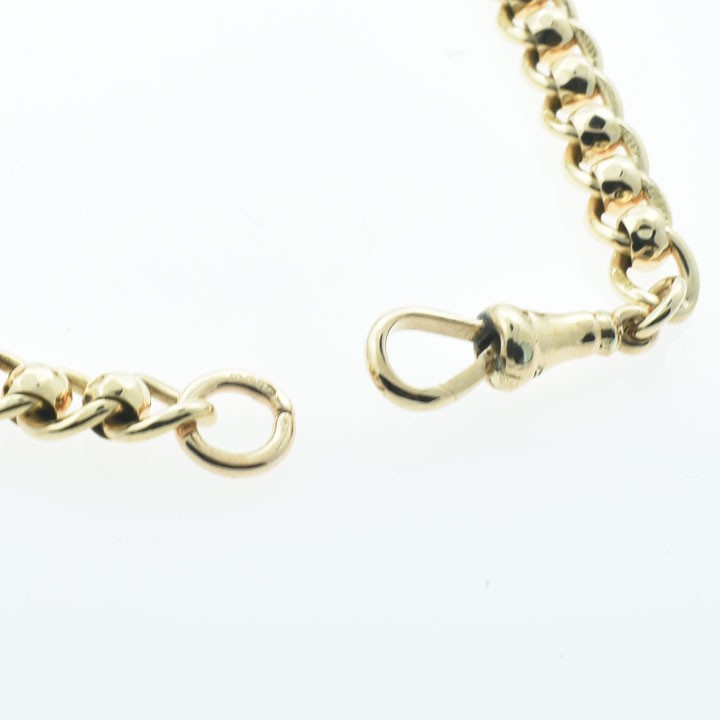 An antique 9ct rose gold chain bracelet featuring circular links inset with rollerballs and fitted with a swivel clasp. View III