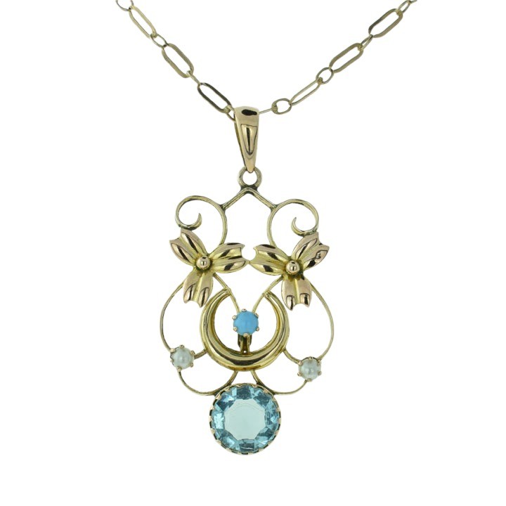 An antique 9ct rose gold openwork pendant featuring a crescent moon motif set with turquoise, seed pearl accents, and a central round faceted blue topaz drop. View III