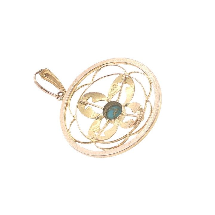 A circular 9ct yellow gold openwork pendant set with a round central turquoise cabochon framed by floral scrollwork. View III