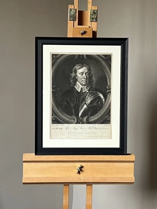 fig 4. Framed monochrome mezzotint print depicting Oliver Cromwell in armour set within an oval cartouche.
