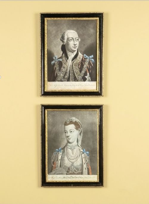 fig 1. A framed pair of 18th-century monochrome mezzotint portraits depicting King George III and Queen Charlotte in decorative ebonised and gilt wood frames.