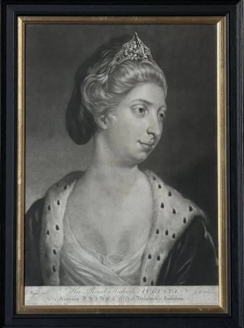 fig 1. A framed monochrome Georgian mezzotint portrait depicting Princess Augusta of Brunswick, encased in a black ebonised frame with a gilded inner sight edge.