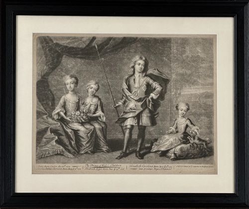 fig 2. A framed monochrome mezzotint print depicting children in eighteenth-century dress with an inscription beneath, mounted in a black wooden frame.