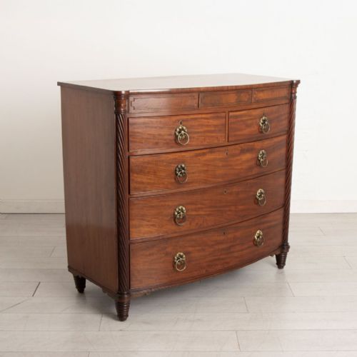 REGENCY MAHOGANY BOW FRONT CHEST OF DRAWERS WITH SECRET DRAWER IN FRIEZE C1820 - ADDITIONAL PHOTO 1