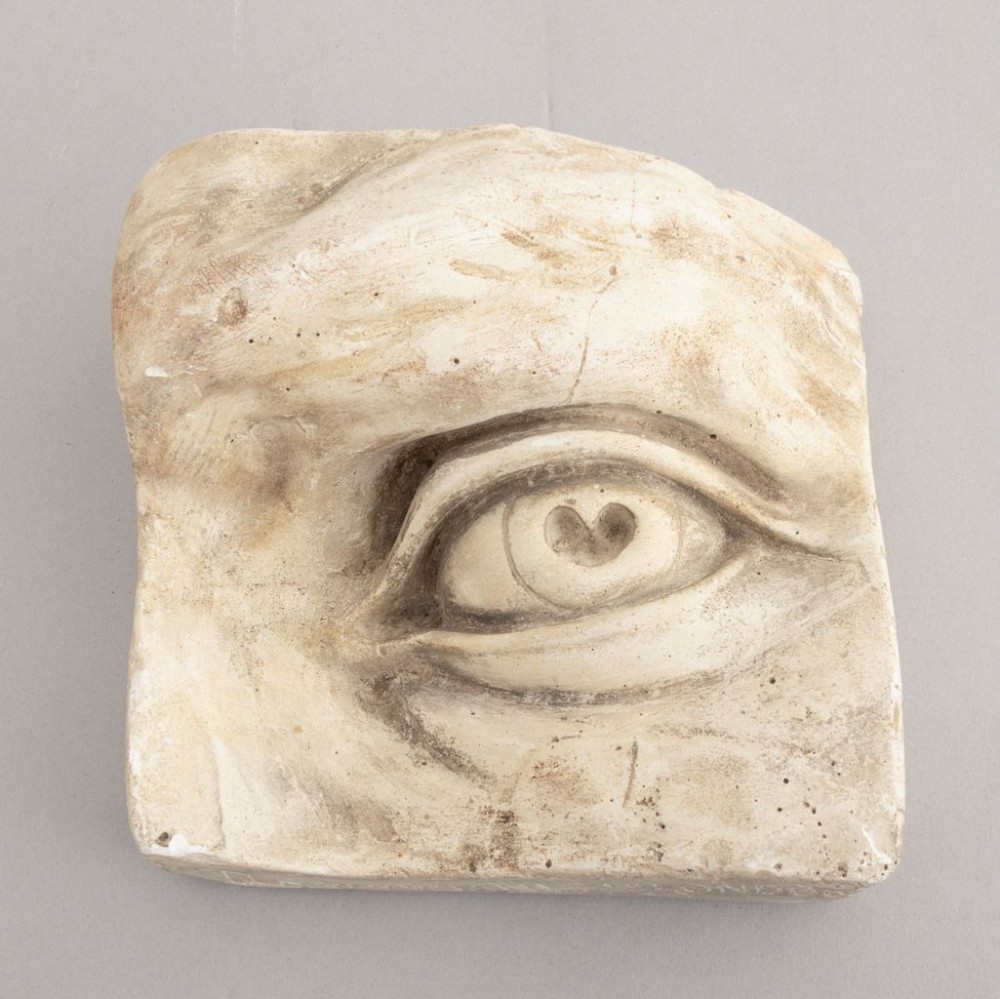 Three 19th-century aged off-white plaster casts displaying sculpted anatomical features including eyes and a nose after Michelangelos David. View VII