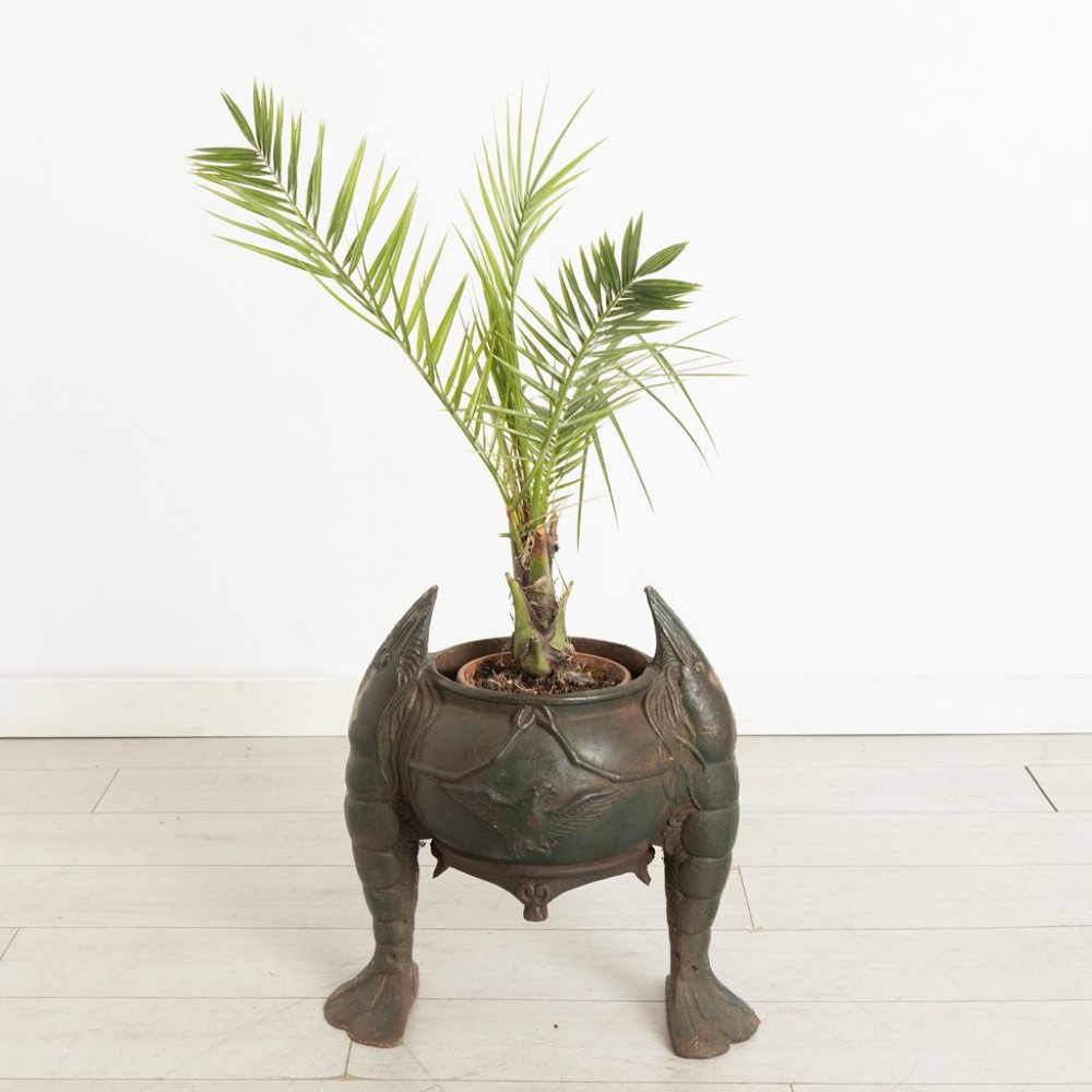 A pair of dark green cast iron planters designed as rounded vessels supported by three carved shrimp legs with relief bird motifs. View II