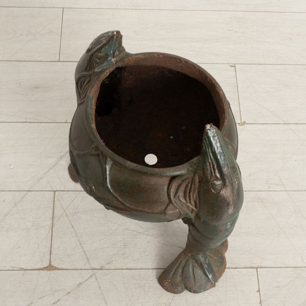 A pair of dark green cast iron planters designed as rounded vessels supported by three carved shrimp legs with relief bird motifs. View III