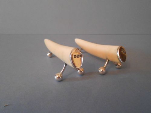 PAIR OF ANTIQUE IVORY AND SILVERMOUNTED KNIFE RESTS 1898 - ADDITIONAL PHOTO 1
