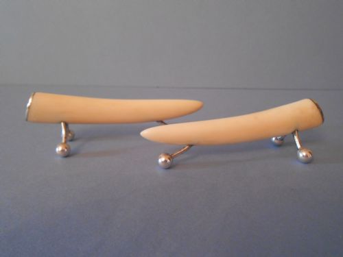 PAIR OF ANTIQUE IVORY AND SILVERMOUNTED KNIFE RESTS 1898 - ADDITIONAL PHOTO 2