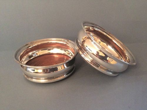 pair of solid silver wine bottle coasters - CATEGORY: ANTIQUE SILVER - DATED 1960