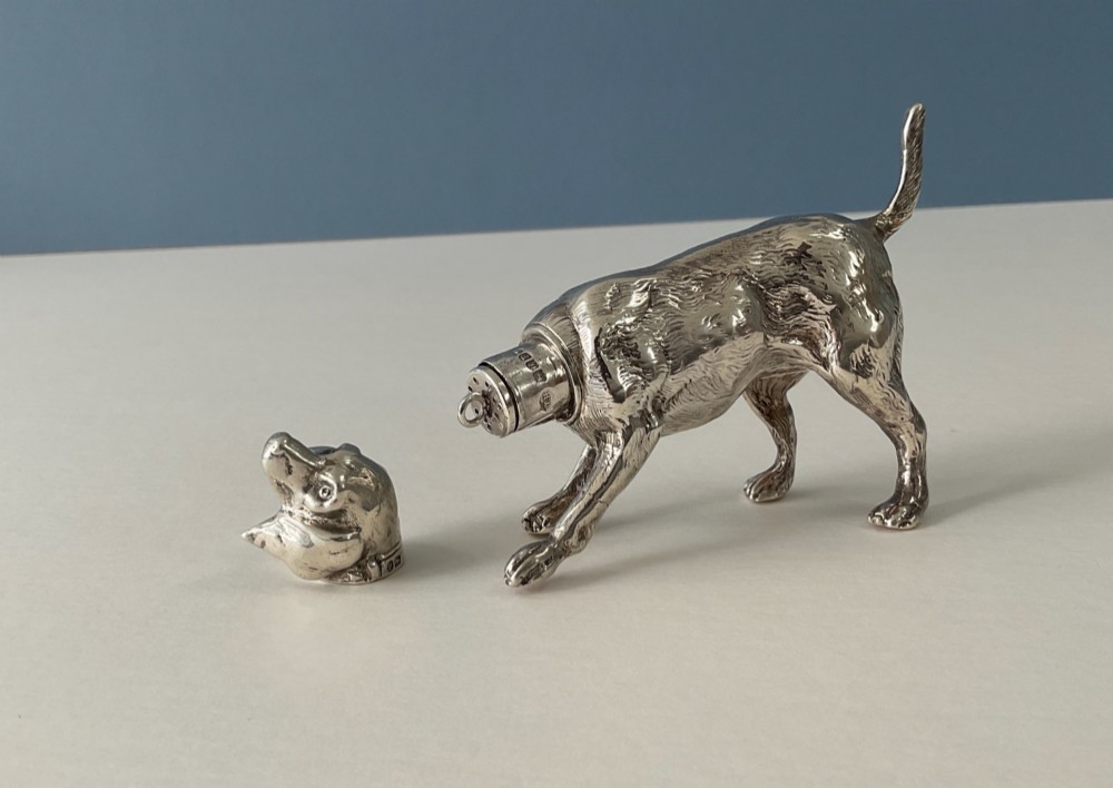 A solid silver novelty pepper pot cast in the detailed form of a standing hunting dog. View VII