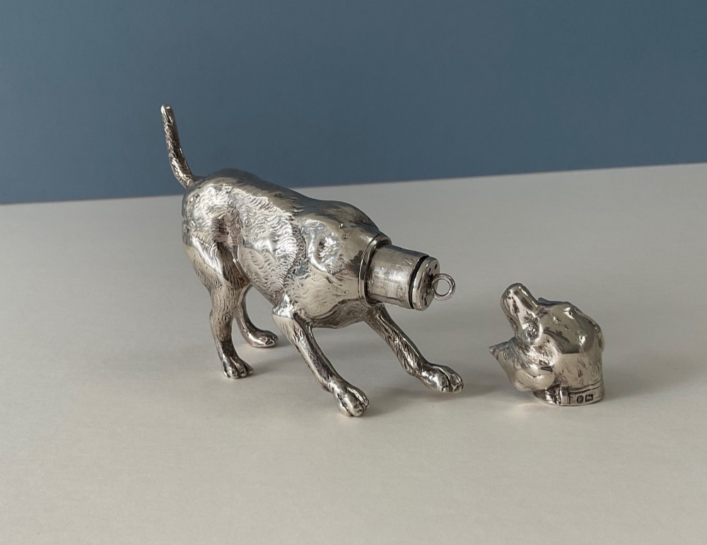 A solid silver novelty pepper pot cast in the detailed form of a standing hunting dog. View VIII