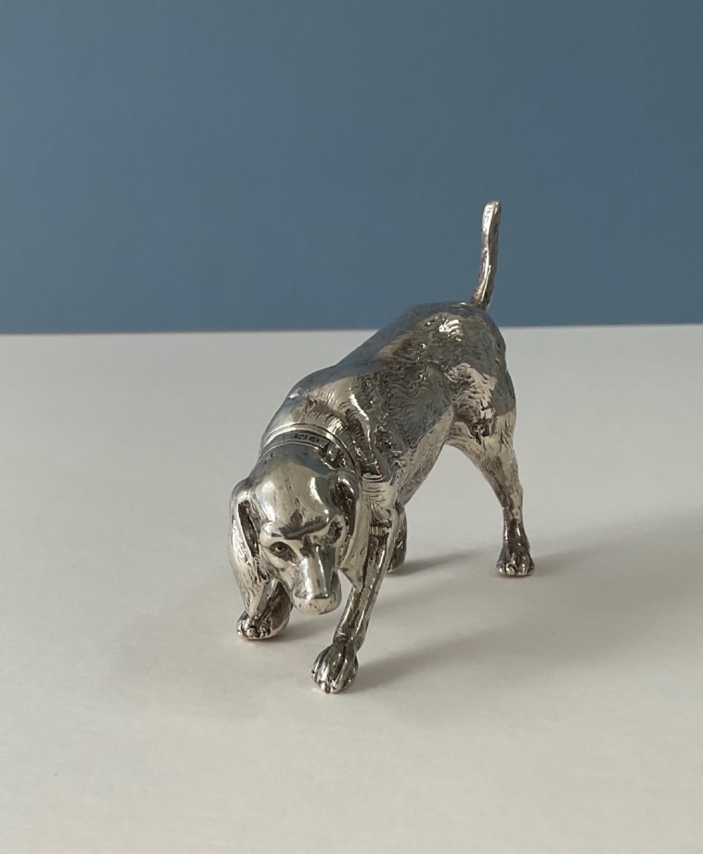 A solid silver novelty pepper pot cast in the detailed form of a standing hunting dog. View IX
