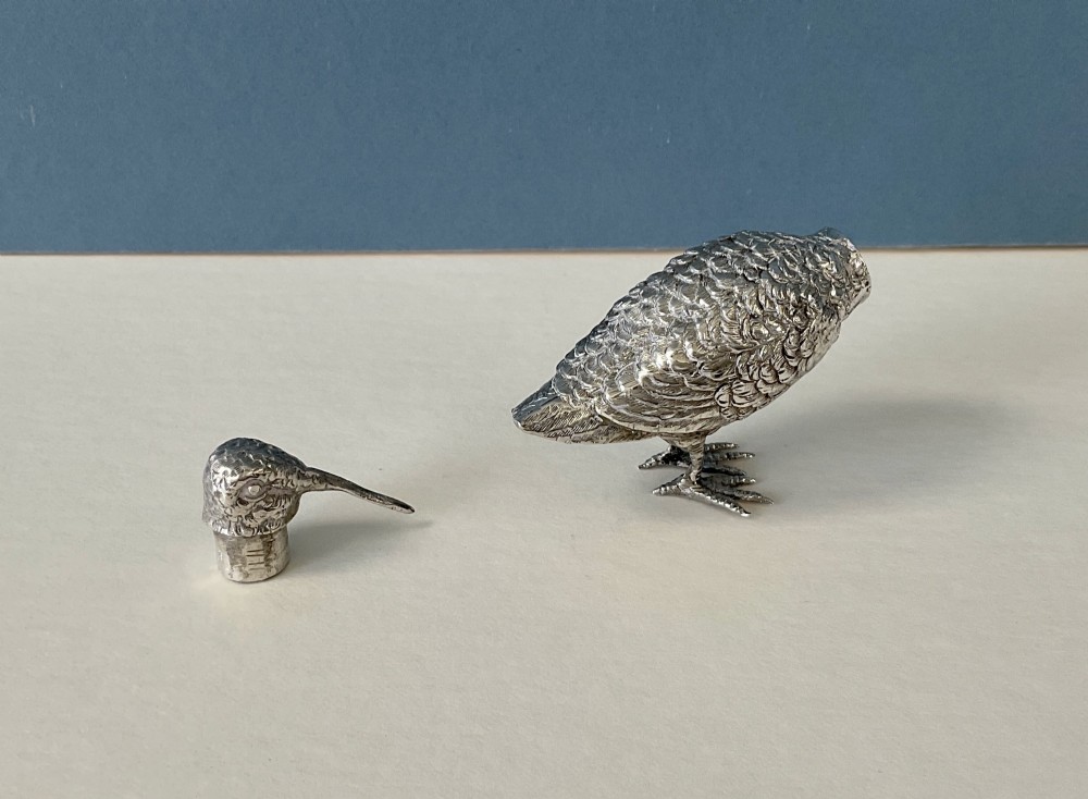 A small silver novelty box sculpted in the form of a standing snipe bird with detailed feather texturing and a long beak. View IV