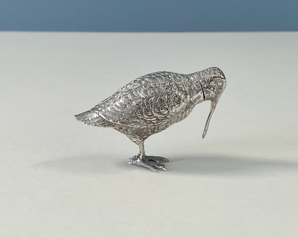 A small silver novelty box sculpted in the form of a standing snipe bird with detailed feather texturing and a long beak. View VII