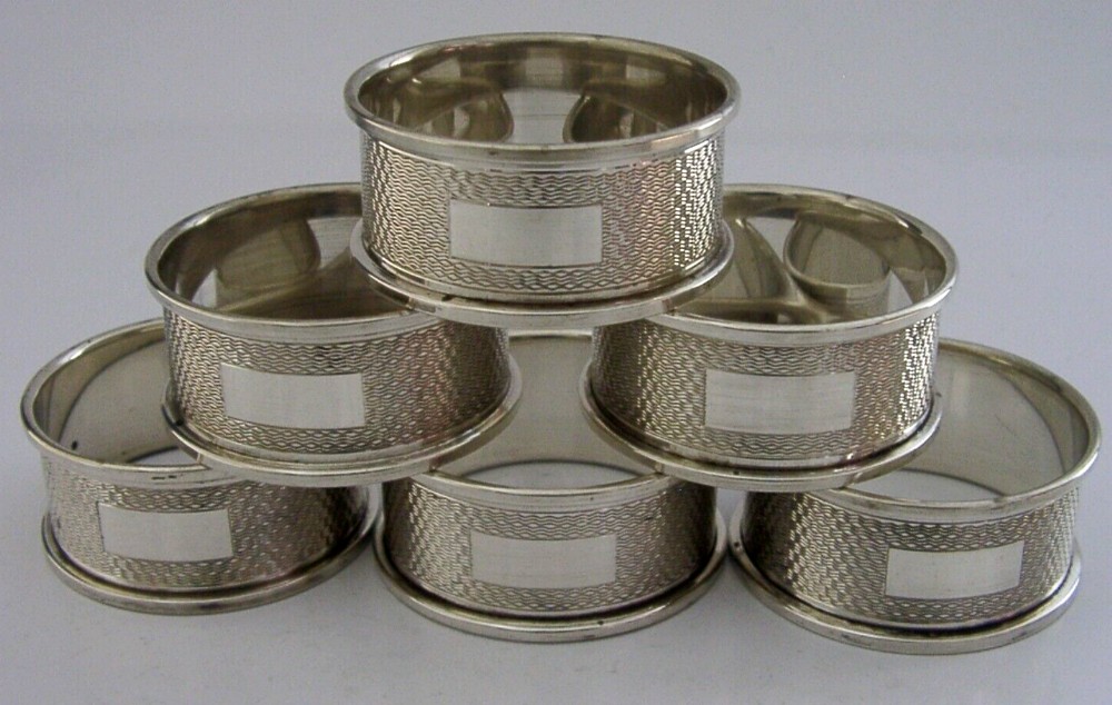 SET of SIX ENGLISH SOLID STERLING SILVER NAPKIN RINGS 1960