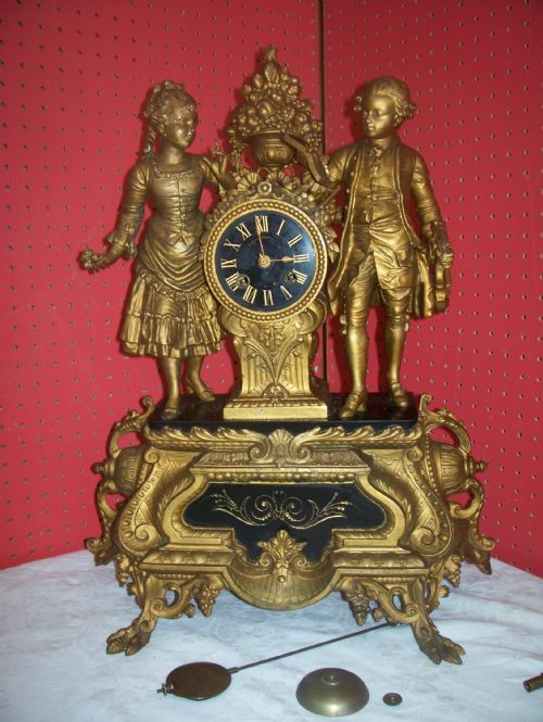 Circa 1840 Gilt with Slate Dial Figural Clock