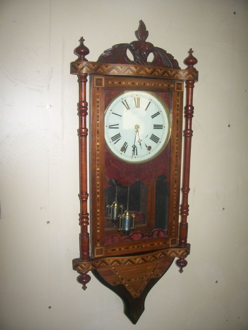 Fine American Specimien Woods Striking Wall Clock