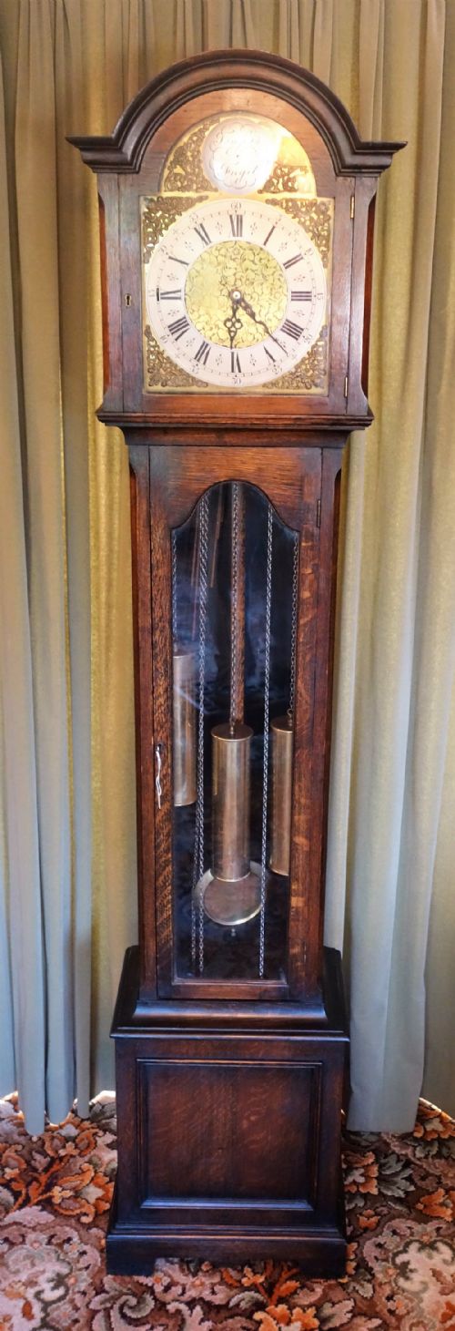 Glass Fronted Triple Weight Westminster Chiming Oak Cased Grandmother or Grandfather Longcase Clock