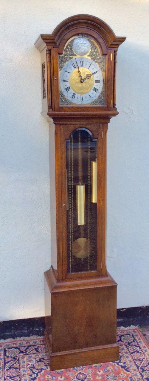 Fine 8 Day Oak Cased Triple Weight Triple Musical Tune Grandmother or Grandfather Longcase Clock