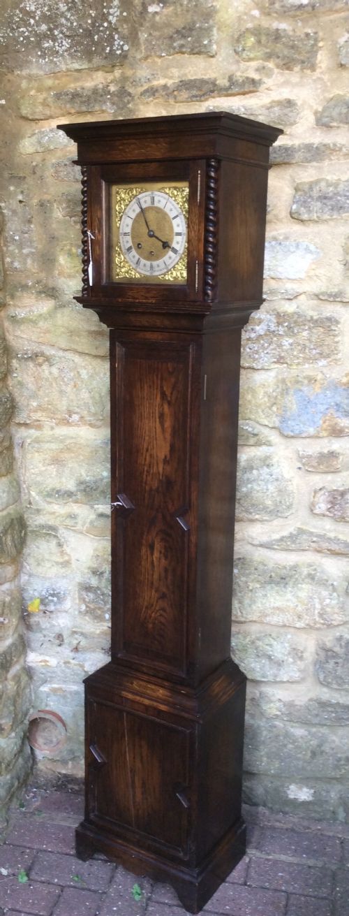 
Charming Small Oak Grandfather or Grandmother Longcase Clock with Barley Twist Columns Playing Westminster Chimes