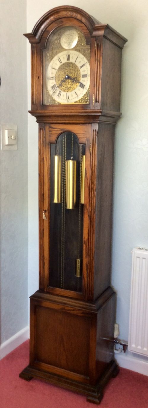 Attractive Glass Fronted Triple Weight Westminster Chiming Grandfather or Grandmother Longcase Clock.