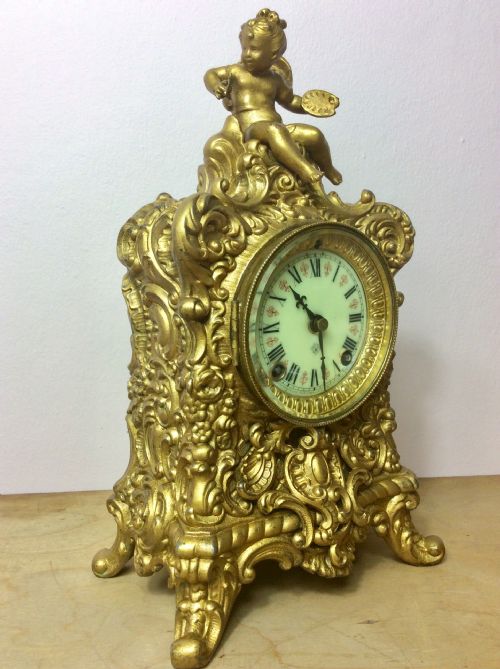 19th C. Gilt Cherub “The Artist” 8day Striking Clock by Ansonia of America