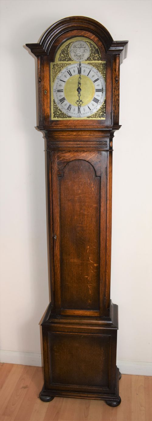 Charming Mellow Sounding Triple Weight Musical Westminster Chiming Oak Grandmother or Grandfather Longcase Clock with Subtle Art Deco Decoration